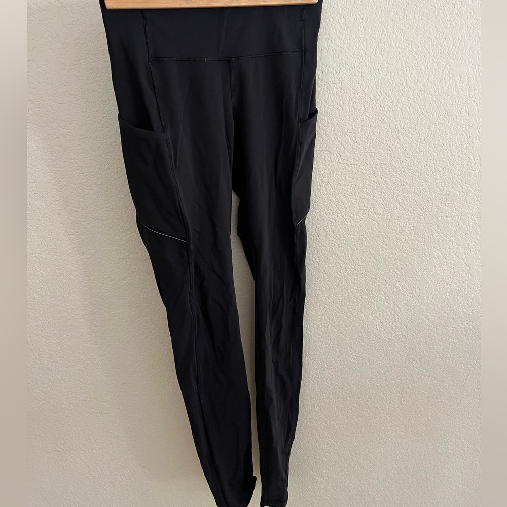 Lululemon black legging with side pockets. Size 4. 7/8 length. 27” inseam.